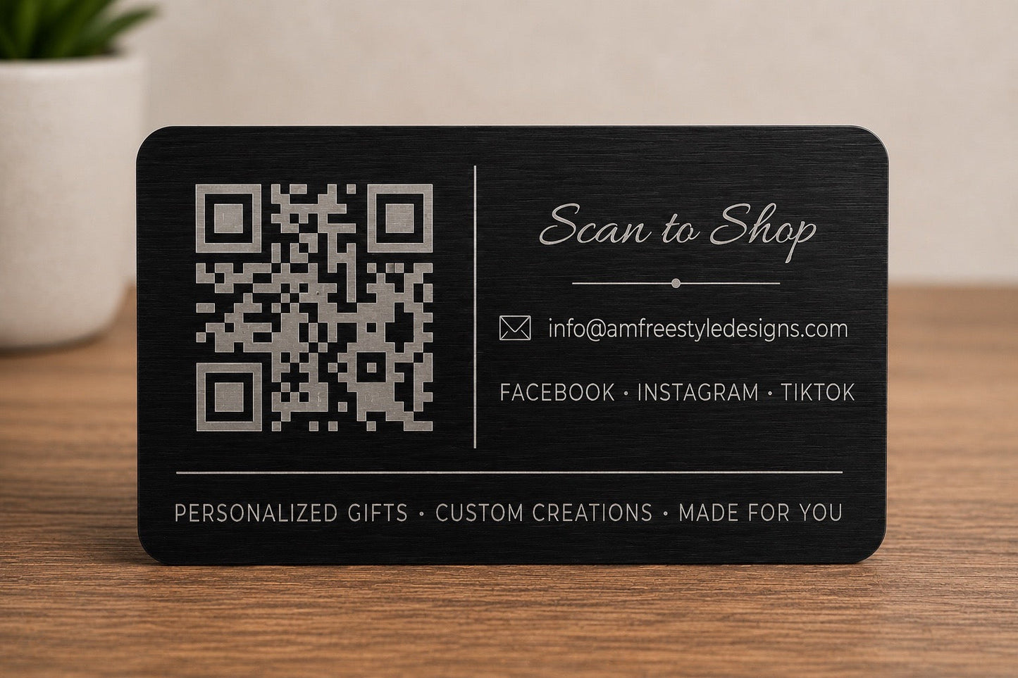Back of custom engraved aluminum QR code card with scan to shop QR code