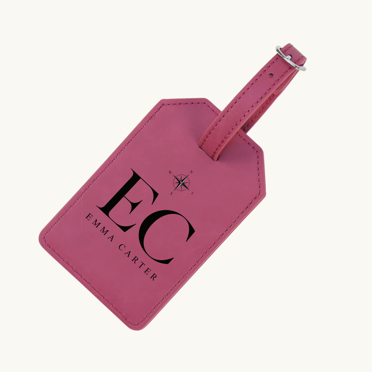 Pink personalized Leatherette luggage tag engraved with EC monogram, Emma Carter name, and compass design