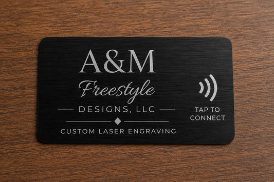 Front of custom engraved black stainless steel NFC QR card with A&M Freestyle Designs logo
